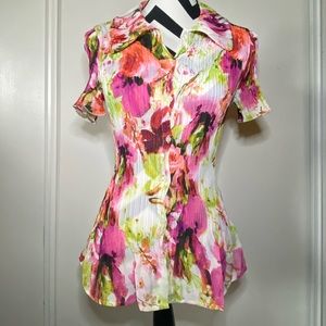 Fitted, short sleeve, button down flower shirt.